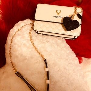 Just in NWOT Tristan Home designs Crossbody bag with gold chain strap